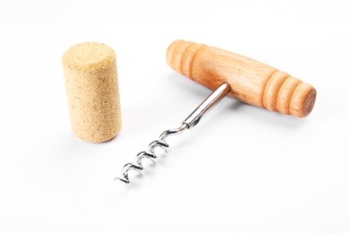 Photo of Corkscrew with wooden handle and cork on white background