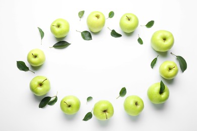 Photo of Frame made of fresh apples and green leaves on white background, flat lay. Space for text