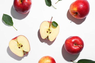 Photo of Flat lay composition with whole and cut apples on white background