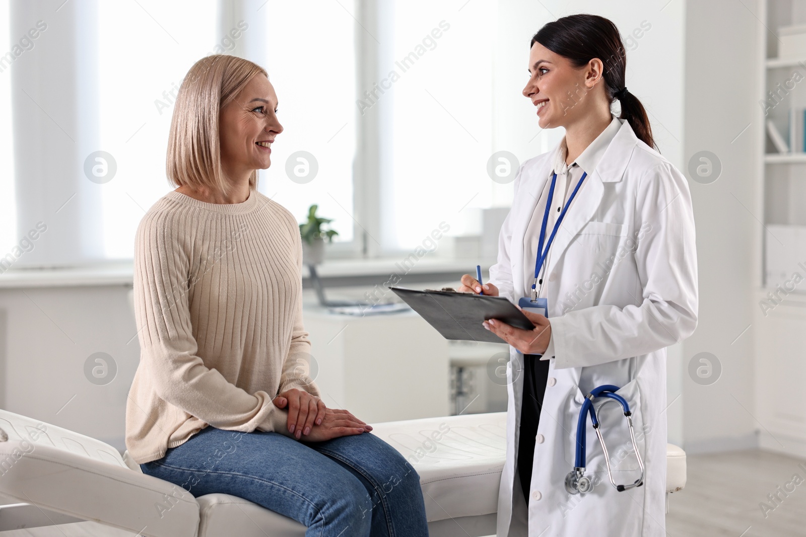 Photo of Woman having appointment with doctor in hospital