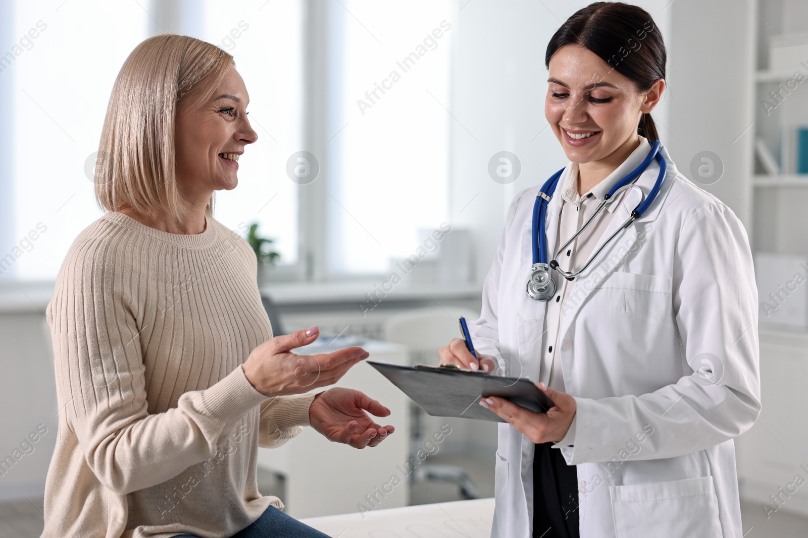 Photo of Woman having appointment with doctor in hospital