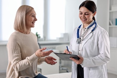 Woman having appointment with doctor in hospital