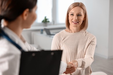 Photo of Woman having appointment with doctor in hospital