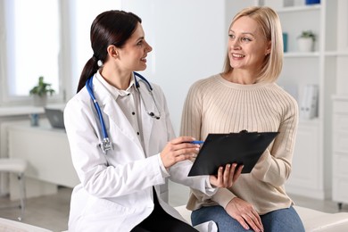 Photo of Woman having appointment with doctor in hospital