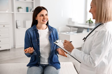 Photo of Woman having appointment with doctor in hospital