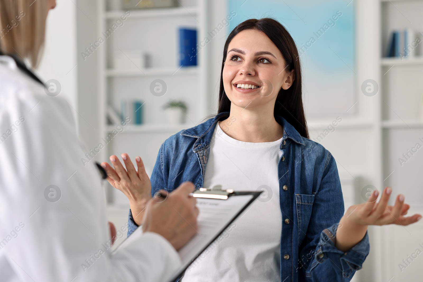 Photo of Woman having appointment with doctor in hospital