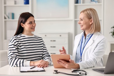 Photo of Woman having appointment with doctor in hospital