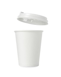 Photo of Paper cup with lid on white background. Mockup for design