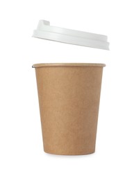 Photo of Paper cup with lid on white background. Mockup for design