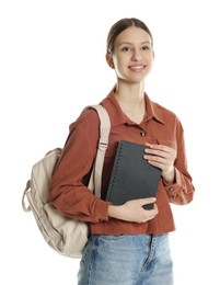 Photo of Portrait of smiling teenage girl with notepad and backpack on white background