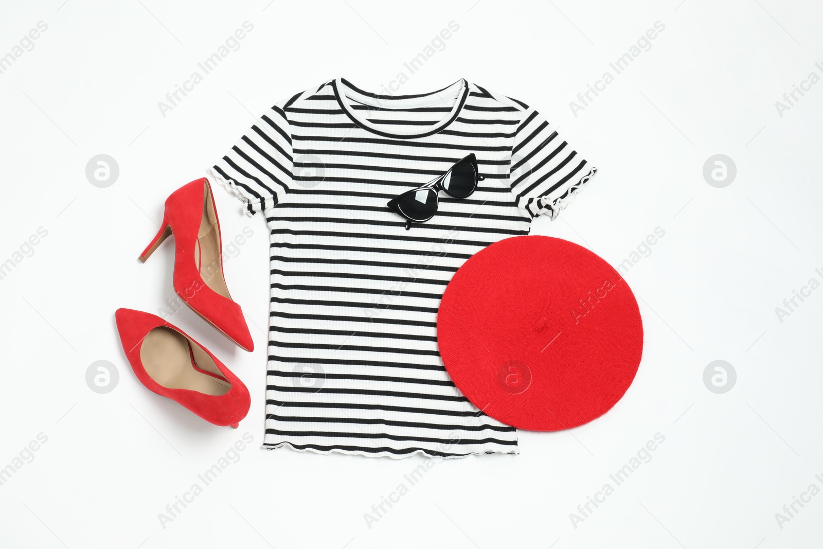 Photo of Retro styled outfit on white background, flat lay