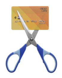 Photo of Credit card and scissors isolated on white