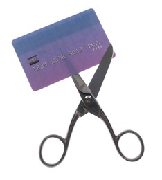 Photo of Credit card and scissors isolated on white