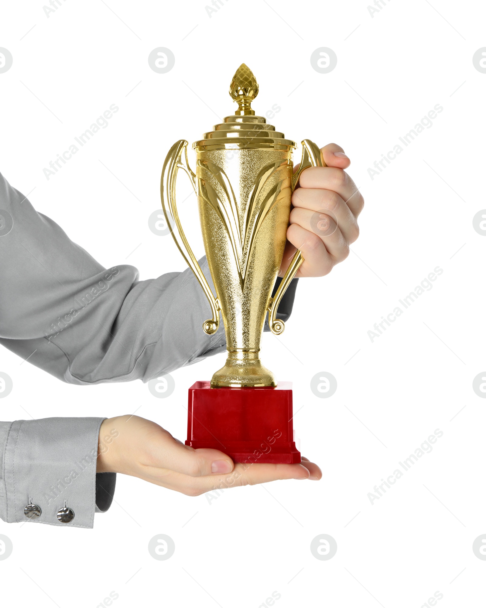 Photo of Woman with golden trophy cup on white background, closeup