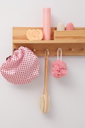 Photo of Shower cap and bath accessories in bathroom