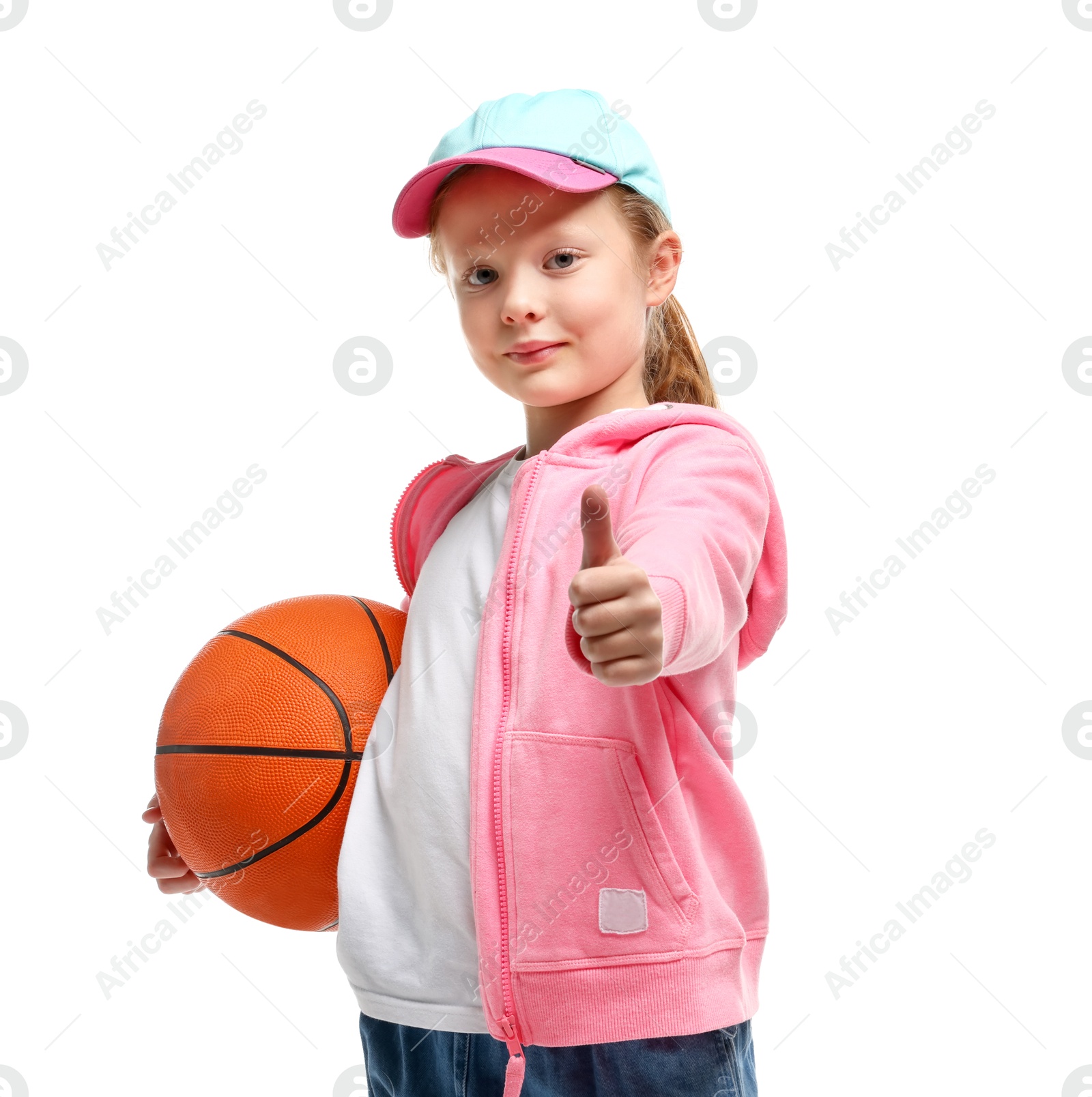 Photo of Little girl with basketball ball showing thumbs up on white background