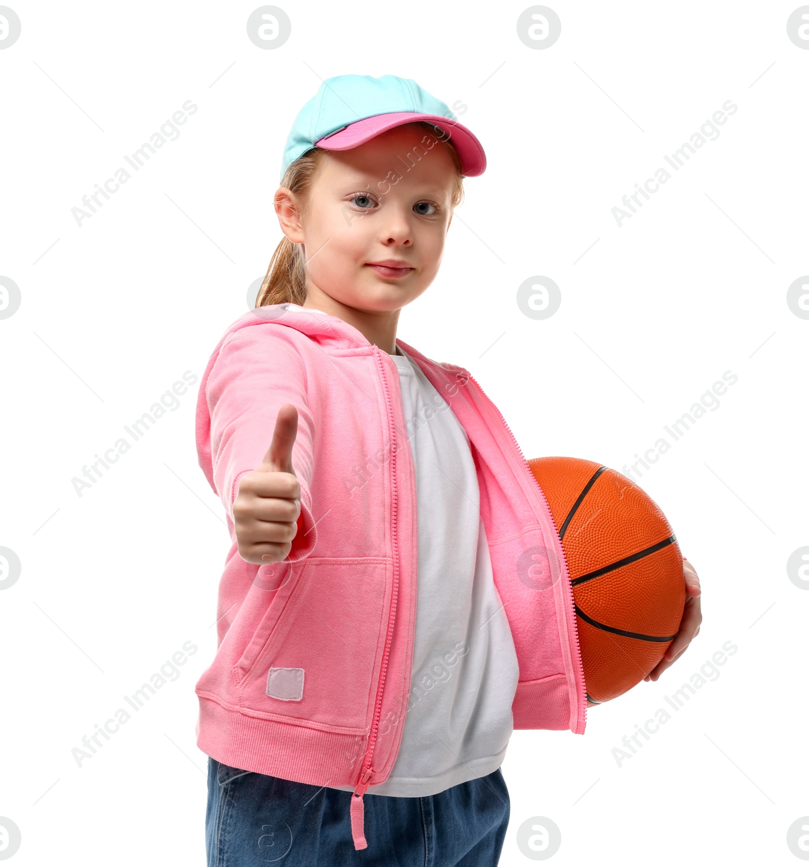 Photo of Little girl with basketball ball showing thumbs up on white background