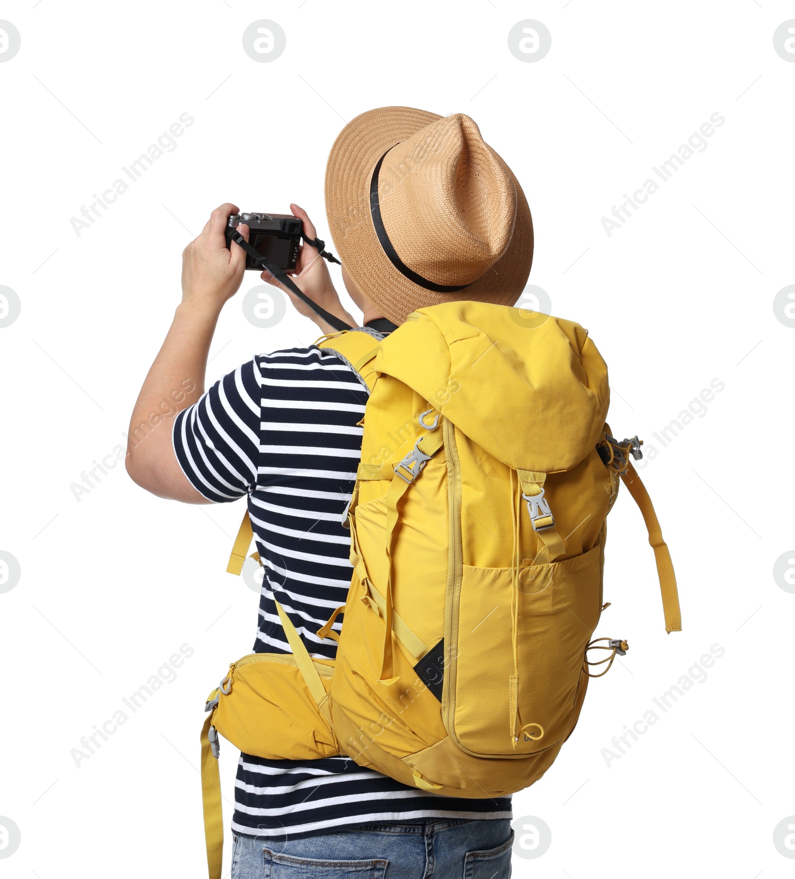 Photo of Traveller with backpack taking photo on white background, back view