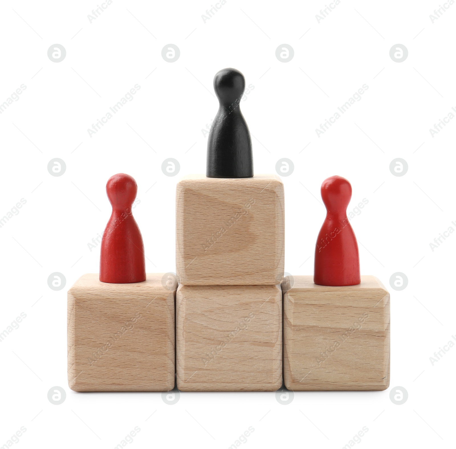 Photo of Red human figures on wooden blocks, black one on top against white background. Competition concept