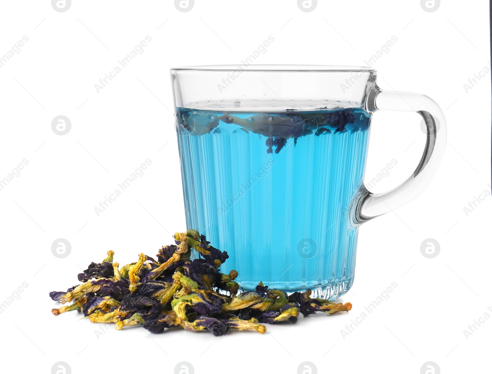 Photo of Delicious butterfly pea flower tea in glass mug and dry petals isolated on white