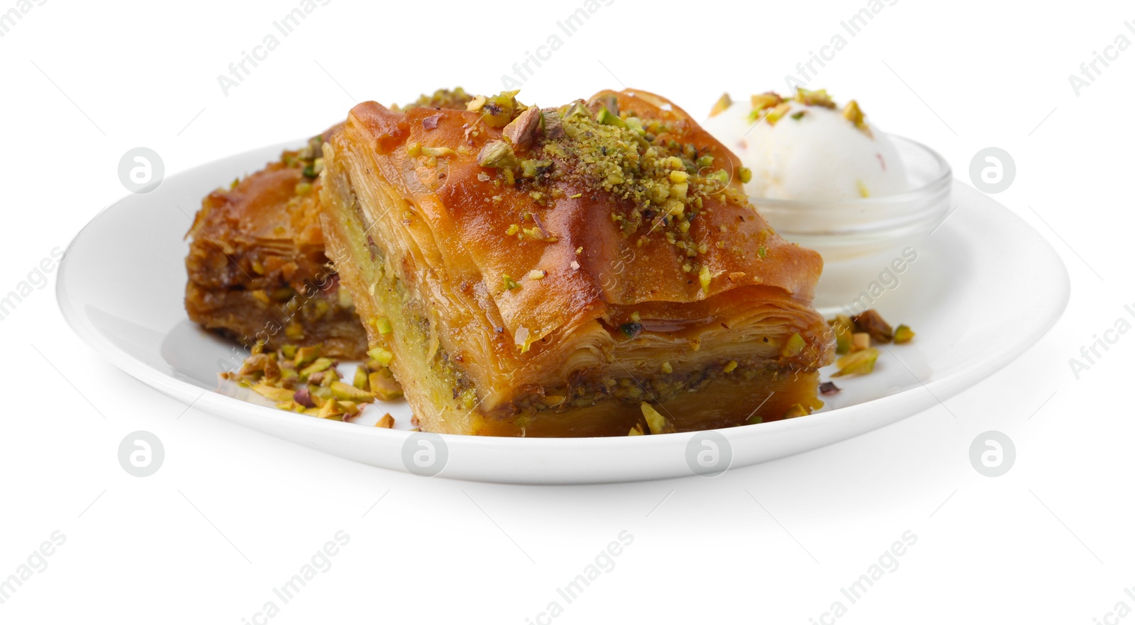 Photo of Tasty baklava with chopped nuts and scoop of ice cream isolated on white