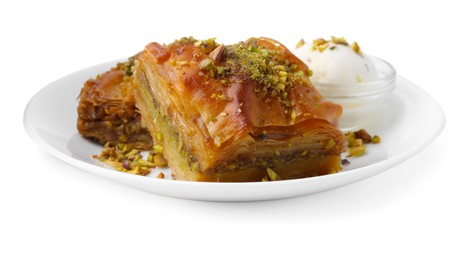 Tasty baklava with chopped nuts and scoop of ice cream isolated on white