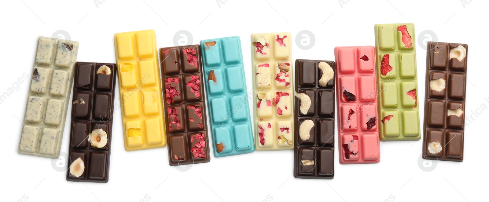 Photo of Different tasty chocolate bars isolated on white, top view