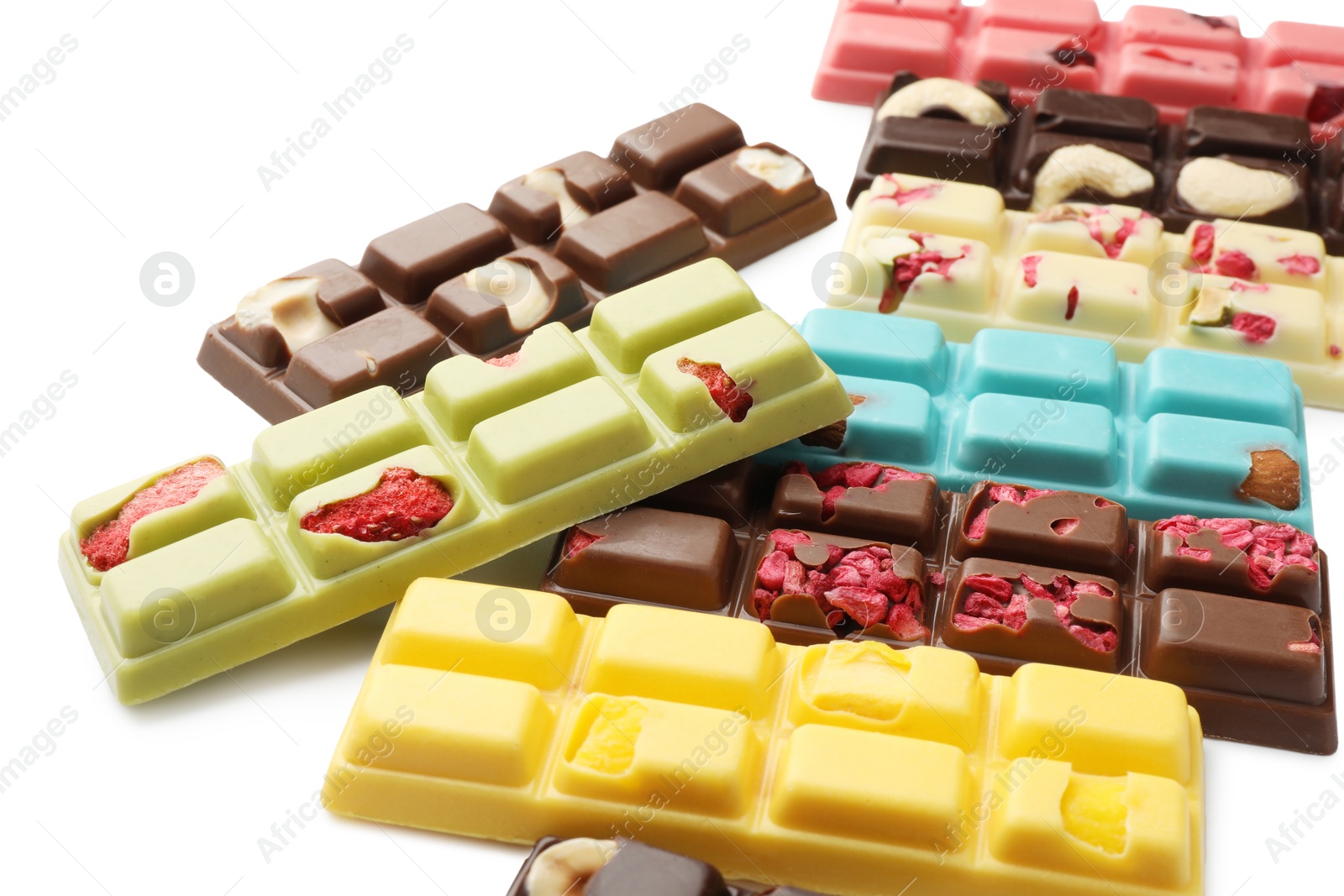 Photo of Different tasty chocolate bars on white background, closeup