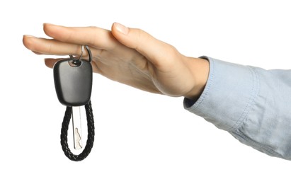 Photo of Woman with car key and keychain on white background, closeup