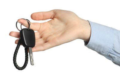 Photo of Woman with car key and keychain on white background, closeup