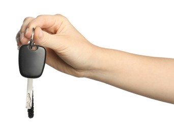 Photo of Woman with car key and keychain on white background, closeup