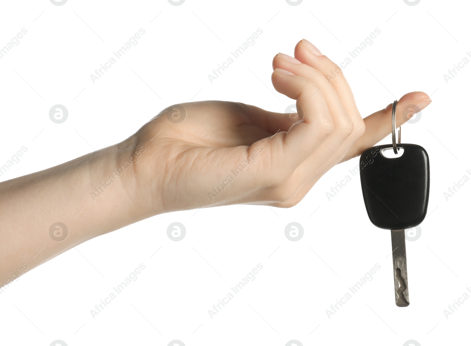Woman with car key on white background, closeup Photo of Woman with car key on white background, closeup