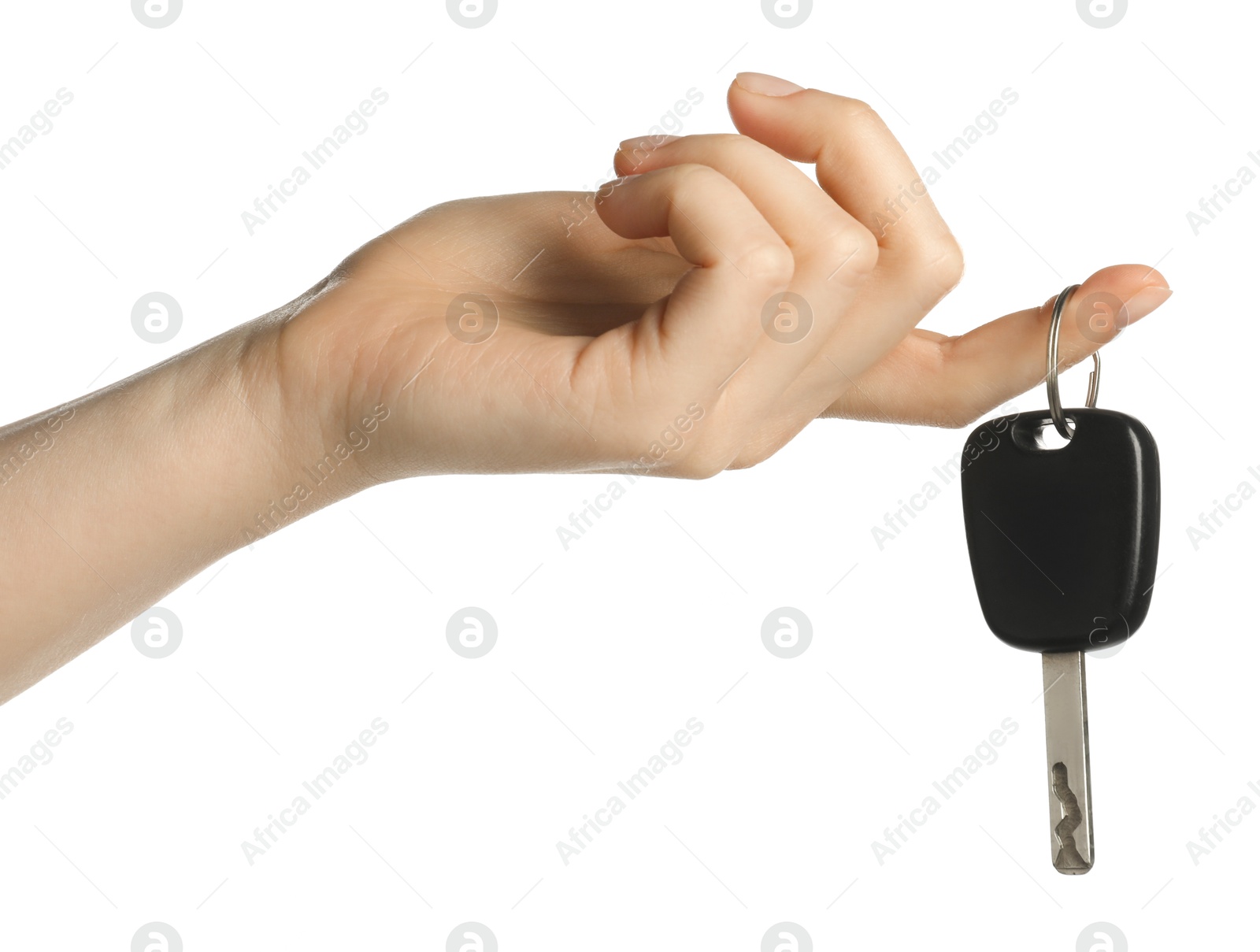 Woman with car key on white background, closeup Photo of Woman with car key on white background, closeup