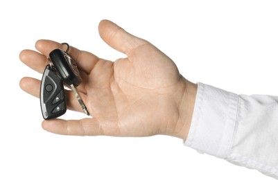 Photo of Man with car keys on white background, closeup