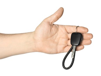 Photo of Man with car key and keychain on white background, closeup