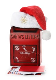 Photo of Santa Claus mail box with hat and letters isolated on white. Christmas tradition