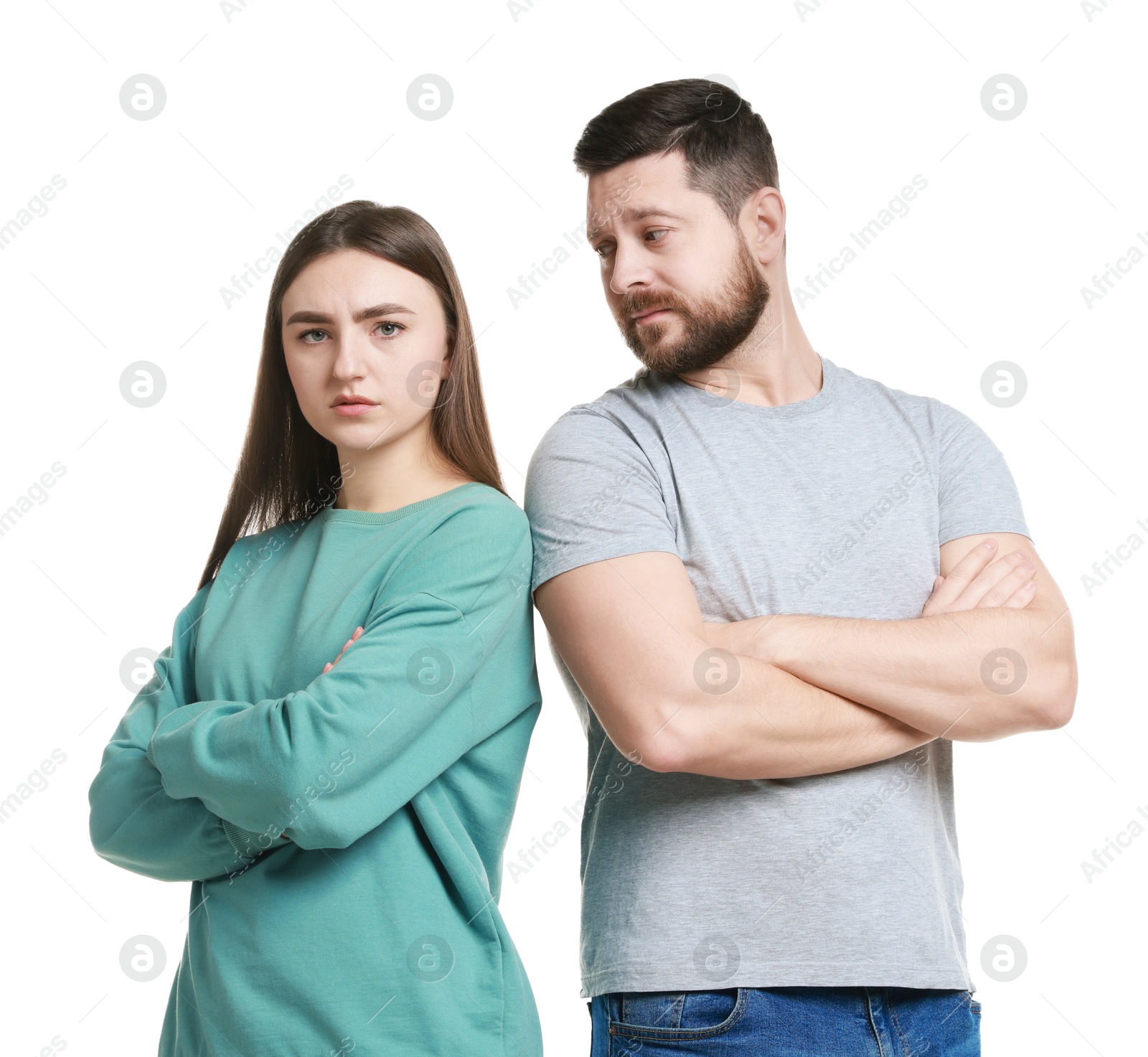 Photo of Resentful couple with crossed arms on white background