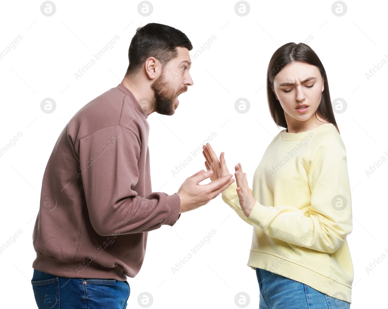 Photo of Angry couple arguing and screaming on white background