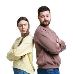 Photo of Resentful couple with crossed arms on white background