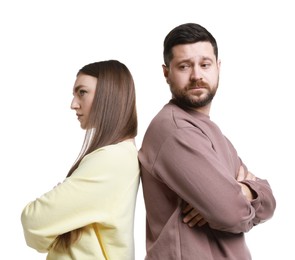 Photo of Resentful couple with crossed arms on white background