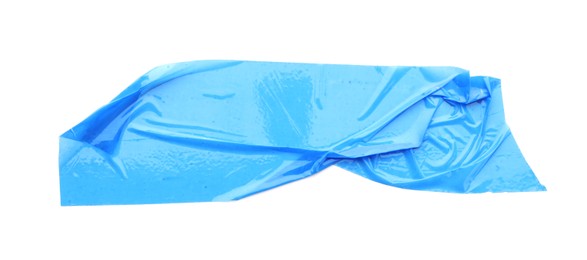 Photo of Strip of light blue adhesive tape on white background, top view