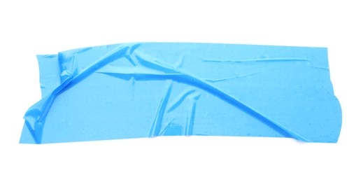 Photo of Strip of light blue adhesive tape on white background, top view