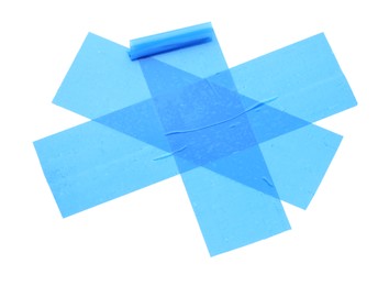 Photo of Strips of light blue adhesive tape on white background, top view