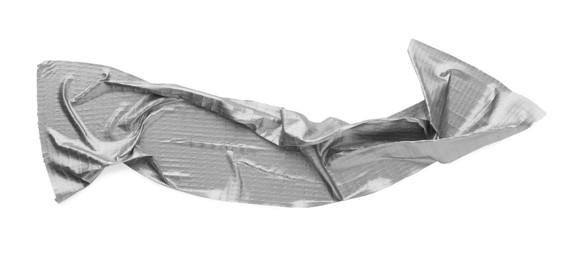 Photo of Wrinkled strip of silver adhesive tape on white background, top view