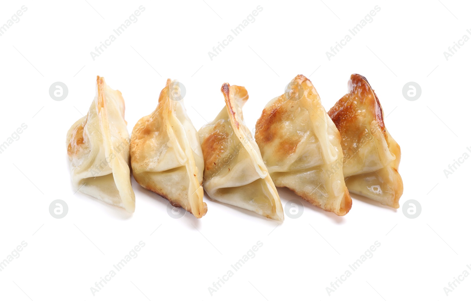 Photo of Delicious fried gyoza dumplings isolated on white