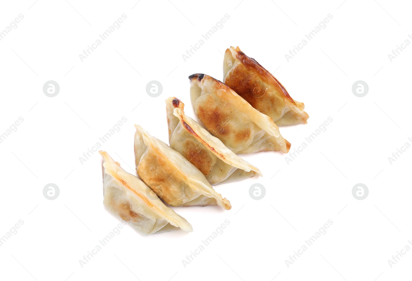 Photo of Delicious fried gyoza dumplings isolated on white, top view