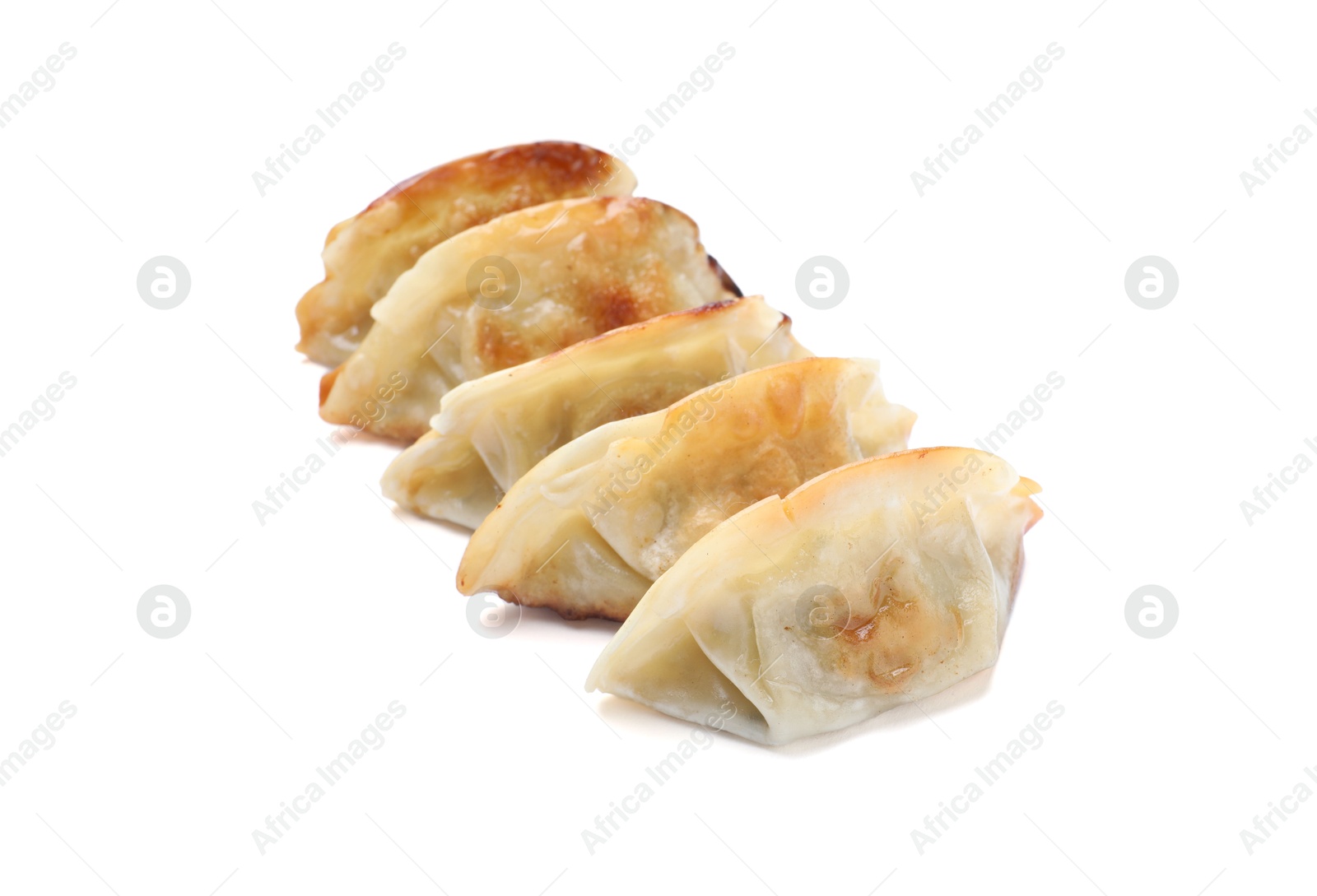 Photo of Delicious fried gyoza dumplings isolated on white