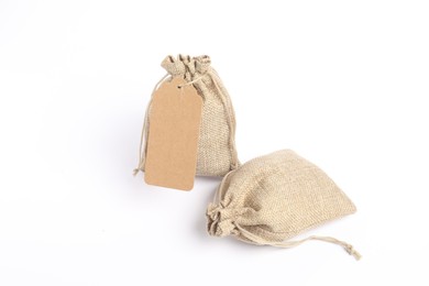 Photo of Two natural burlap bags isolated on white