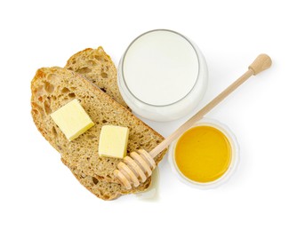 Photo of Slices of bread with butter, milk and honey isolated on white, top view