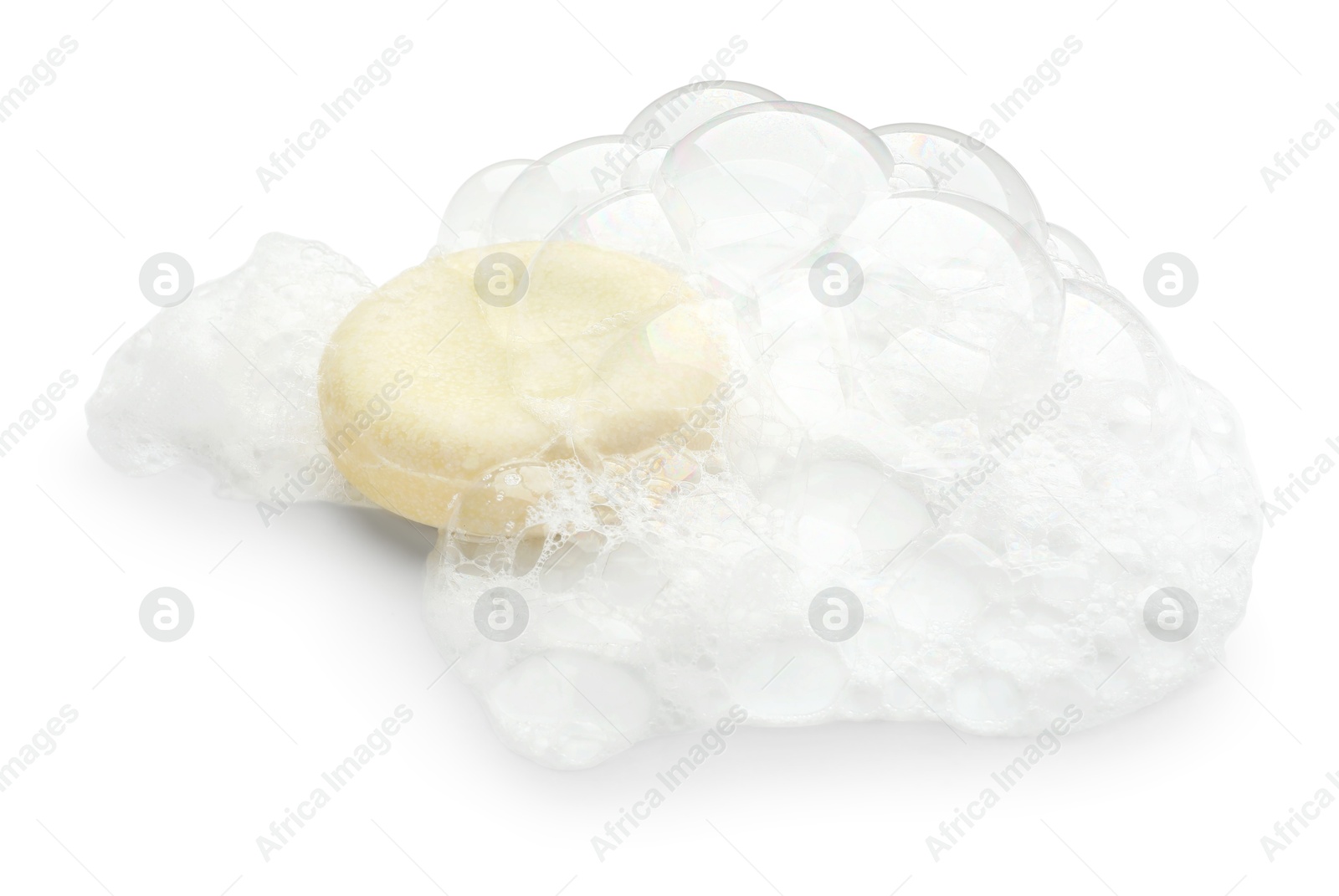 Photo of Round soap with foam on white background